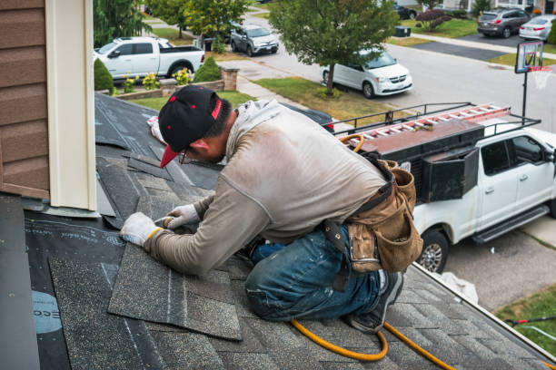 Professional Roofing technician working in Burnsville, NC